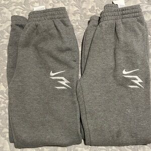 Two Nike sweats jogger lounge wear 10 12
